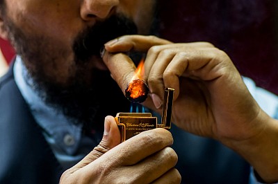 man smoking a cigar